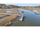 Picturesque aerial view of waterways, docks, and boats amidst marshland and waterways at 3232 Pignatelli Cres, Mount Pleasant, SC 29466