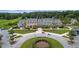 Aerial view of the community clubhouse with manicured grounds, flags, and parking at 3232 Pignatelli Cres, Mount Pleasant, SC 29466