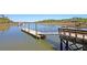 Community pier featuring boat lifts and beautiful water views in a lovely coastal neighborhood at 3232 Pignatelli Cres, Mount Pleasant, SC 29466