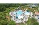 Aerial view of the community pool featuring a slide, seating, and palm trees at 3232 Pignatelli Cres, Mount Pleasant, SC 29466