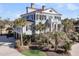 Elegant two-story home with black shutters, red roof and mature landscaping at 3232 Pignatelli Cres, Mount Pleasant, SC 29466
