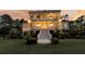 Elegant home with grand staircase leading to covered porch with plenty of space at 3232 Pignatelli Cres, Mount Pleasant, SC 29466