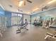 Well-equipped community gym featuring weight machines, free weights, and mirrored walls for exercise at 3232 Pignatelli Cres, Mount Pleasant, SC 29466