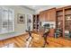 Charming home office with custom built-ins, hardwood floors, and abundant natural light at 3232 Pignatelli Cres, Mount Pleasant, SC 29466