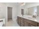Bathroom with double vanity, white marble tile, and modern fixtures at 359 Blue Oak Dr, Moncks Corner, SC 29461