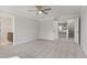 Spacious bedroom with neutral carpeting, a ceiling fan, and an ensuite bathroom at 359 Blue Oak Dr, Moncks Corner, SC 29461