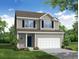Charming two-story home with a well-manicured lawn, beautiful landscaping, and a two car garage at 359 Blue Oak Dr, Moncks Corner, SC 29461