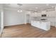 Modern kitchen with white cabinets, stainless steel appliances, and a large kitchen island at 359 Blue Oak Dr, Moncks Corner, SC 29461