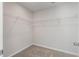 Walk-in closet with neutral carpeting, ample shelving and storage at 359 Blue Oak Dr, Moncks Corner, SC 29461