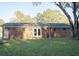 Brick house with large backyard and double door access from inside at 380 Furman Ln, Ladson, SC 29456