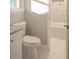 Bathroom featuring toilet, tub with marble-look tile and granite-topped vanity at 380 Furman Ln, Ladson, SC 29456