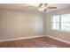 Neutral bedroom with hardwood floors and a ceiling fan at 380 Furman Ln, Ladson, SC 29456
