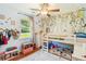 Charming bedroom with bunk beds and playful wallpaper design at 380 Furman Ln, Ladson, SC 29456