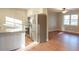 Open concept with stainless steel refrigerator, stone counter and modern appliances at 380 Furman Ln, Ladson, SC 29456