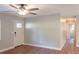 Bright living room with laminate floors, fresh paint, and white trim at 380 Furman Ln, Ladson, SC 29456