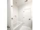 Bright bathroom with a soaking tub, subway tile, and white fixtures at 3845 Delinger Dr, Mount Pleasant, SC 29466