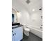 Bright bathroom features subway tile, dark hexagonal floor, and bathtub with dark fixtures at 3845 Delinger Dr, Mount Pleasant, SC 29466