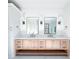 Bathroom featuring double vanity with custom mirrors and sconces at 3845 Delinger Dr, Mount Pleasant, SC 29466