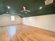 Large bonus room with hardwood floors, painted ceilings, and recessed lighting at 3845 Delinger Dr, Mount Pleasant, SC 29466