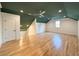 Spacious bonus room with hardwood floors and a dark painted ceiling at 3845 Delinger Dr, Mount Pleasant, SC 29466