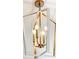 Close-up of a modern white and gold chandelier with multiple bulbs at 3845 Delinger Dr, Mount Pleasant, SC 29466