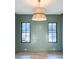 Living room with striking trimwork, recessed lighting, and large windows providing lots of natural light at 3845 Delinger Dr, Mount Pleasant, SC 29466