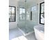 Modern glass walk-in shower featuring black trim and eye-catching tile floor at 3845 Delinger Dr, Mount Pleasant, SC 29466