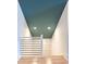 Staircase featuring black metal railings and hardwood floors, offering modern design at 3845 Delinger Dr, Mount Pleasant, SC 29466