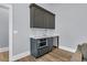 This bar area features a dark grey sink, microwave, and plenty of cabinet space at 3851 Sawyers Island Dr, Mount Pleasant, SC 29466