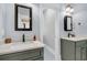 Dual vanity sinks with modern fixtures, white countertop and hexagon tile at 3851 Sawyers Island Dr, Mount Pleasant, SC 29466