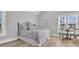 This spacious bedroom has a seating area, table and chairs, and lots of natural light at 3851 Sawyers Island Dr, Mount Pleasant, SC 29466