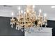 Close-up of a ornate chandelier with crystal pendants and decorative elements at 3851 Sawyers Island Dr, Mount Pleasant, SC 29466