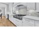 Bright kitchen showcases white cabinets, countertops, and stainless steel appliances at 3851 Sawyers Island Dr, Mount Pleasant, SC 29466