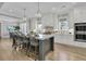 Bright kitchen features a marble top island with seating and modern appliances at 3851 Sawyers Island Dr, Mount Pleasant, SC 29466