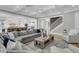 Spacious living room with coffered ceiling, open floor plan, and staircase at 3851 Sawyers Island Dr, Mount Pleasant, SC 29466