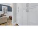View of a living room from behind a pantry with a chandelier and comfortable seating at 3851 Sawyers Island Dr, Mount Pleasant, SC 29466