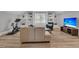 Inviting living area with a sofa, chair, and a wall-mounted TV, perfect for relaxation and entertainment at 3851 Sawyers Island Dr, Mount Pleasant, SC 29466