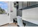 Practical mud room featuring a built-in desk, ample storage, and a convenient outdoor exit at 3851 Sawyers Island Dr, Mount Pleasant, SC 29466