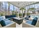 Relaxing covered patio with cozy seating and outdoor decor near the pool at 3851 Sawyers Island Dr, Mount Pleasant, SC 29466