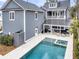 Stunning backyard oasis with a private pool, jacuzzi, lounge area, and outdoor shower at 3851 Sawyers Island Dr, Mount Pleasant, SC 29466