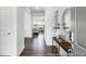 Open entryway with hardwood floors and view into the spacious living room at 411 Avocet Dr # 554P, Summerville, SC 29486