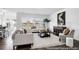 Bright living room with lots of natural light, modern furniture, and hardwood floors at 411 Avocet Dr # 554P, Summerville, SC 29486