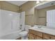 Bright bathroom with a tub and shower combo, and a wood vanity at 512 Resinwood Rd, Moncks Corner, SC 29461