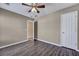 Bedroom featuring hard surface floors, closet and ceiling fan at 512 Resinwood Rd, Moncks Corner, SC 29461