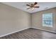 Bedroom featuring hard surface floors, window and ceiling fan at 512 Resinwood Rd, Moncks Corner, SC 29461