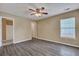 Spacious bedroom with ceiling fan, lots of natural light, and ensuite access at 512 Resinwood Rd, Moncks Corner, SC 29461