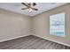 Bright bedroom featuring a ceiling fan, hard surface floors and window at 512 Resinwood Rd, Moncks Corner, SC 29461