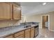 Kitchen with stainless steel appliances, a sink, and light wood cabinets at 512 Resinwood Rd, Moncks Corner, SC 29461