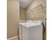 Bright laundry room featuring a full-size washer and dryer and wire shelving at 512 Resinwood Rd, Moncks Corner, SC 29461