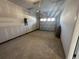 This home includes an unfinished garage with an overhead garage door at 5120 Double Eagle, Summerville, SC 29485